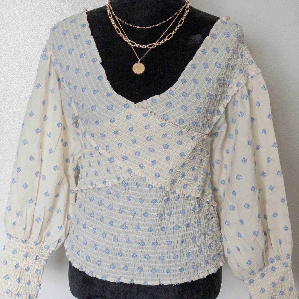 Cross body ruched floral blouse